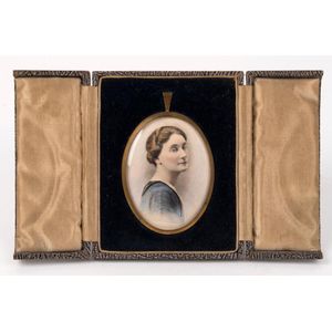 A vintage hand-painted miniature portrait of a lady in gilt…