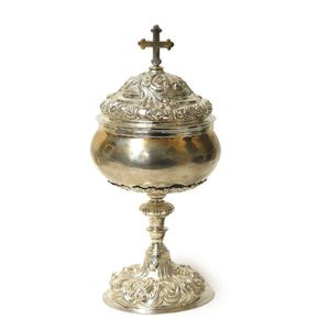 An antique silver ciborium, plain compressed spherical body…
