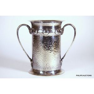 An Arts & Crafts silver plated wine cooler, circa 1900, with…