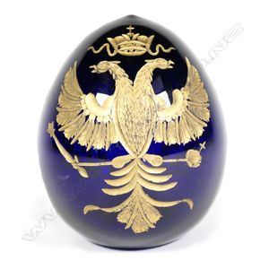 A cobalt blue glass egg engraved in the Russian Imperial manner,…