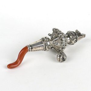 A Victorian silver and coral baby's rattle, the elaborately…