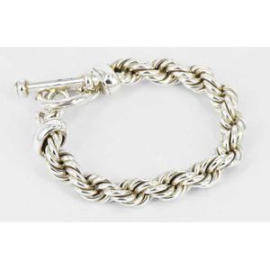 A Mexican sterling silver bracelet, twisted design. Weight 56g