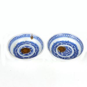 A pair of Chinese blue and white porcelain sauce dishes, Kangxi…