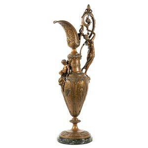 A Renaissance style ornamental ewer with figural handle on…