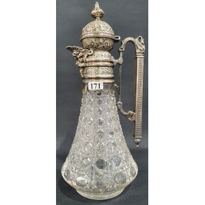 A Victorian silver plated and cut crystal claret jug, with mask…