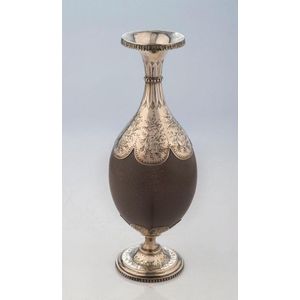 An Australian emu egg ornament with engraved silver plated…