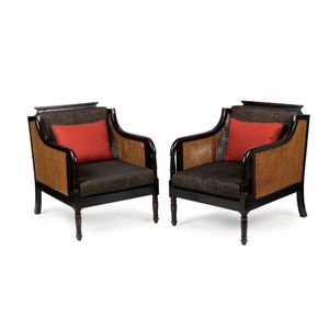 A pair of bespoke cane sided armchairs and cushions by Riddell…