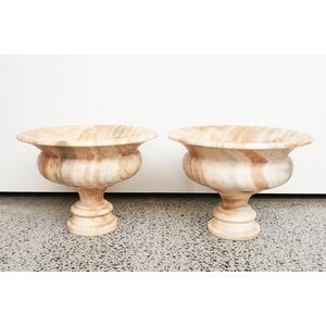 Three alabaster garden urns, of circular form, pierced (3),…