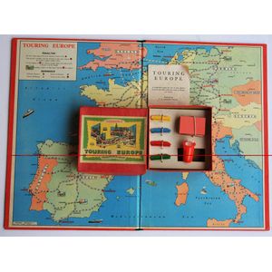 'Touring Europe' board game with 4 diecast coupes, cards, rules,…