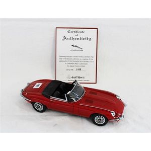 An Autoart 1:18 Jaguar E-type Roadster series 1, with…