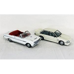 A Sunstar 1963 Ford Falcon Futura, and a Biante Holden Commodore