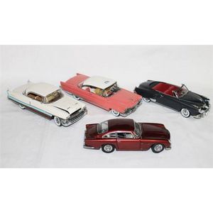 Four various models, including Danbury Mint 1964 Aston Martin…