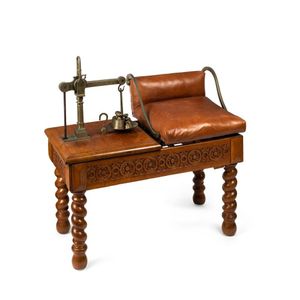 A set of English brass, oak and leather jockey's scales by…