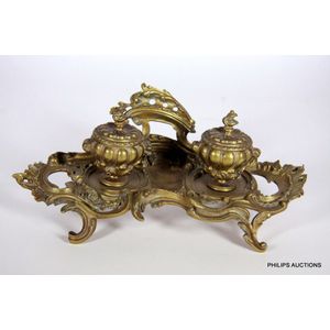 An ormolu desk set, 19th century, the rococo desk set cast and…