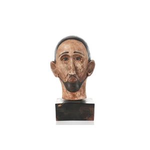 Head of a religious figure. Carved and painted wood, mounted on…