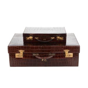 Travelling kit, 20th century. Monogrammed 'Pc', comprising two…