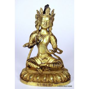 A gilded bronze green Tara figure, the sinuously posed goddess&hellip;