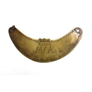 Aboriginal King plate. Crescent form, brass with rustic…