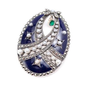 An enamelled silver gemset pendant brooch; stylised egg in…