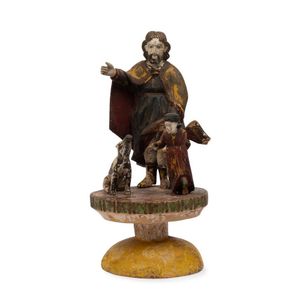 A carved wood with polychrome finish group depicting St. Roch…