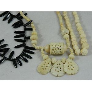 Two bone necklaces and one French jet necklace
