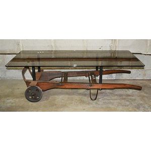 A Wheelbarrow Railway trolley table, with smoky glass top