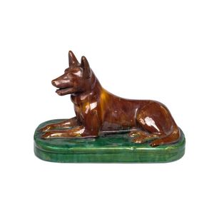 McHugh, a pottery doorstop in the form of a kelpie, incised:…