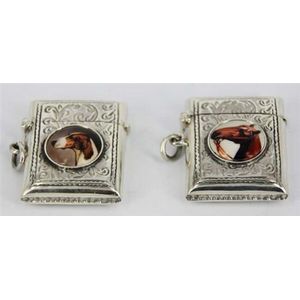 Two silver vesta cases, both with an enamel panel, one…