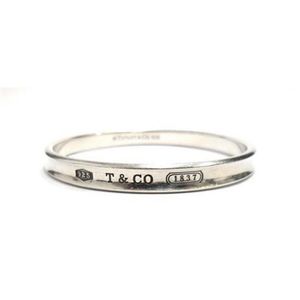 A Sterling Silver 17 Bangle By Tiffany Co Oval Concaved Bracelets Bangles Jewellery