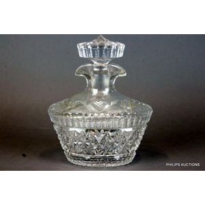 A heavy cut crystal ships decanter, the heavy oval form ships…