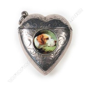 An Edwardian silver and enamel vesta case, heart shape, the…