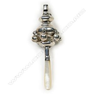 A Victorian silver and mother of pearl baby rattle, traditional…