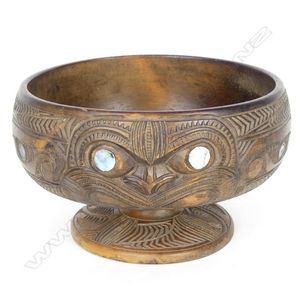 An early 20th century Maori carved kauri pedestal bowl, the…