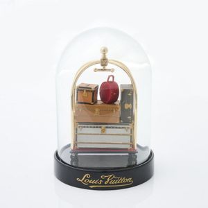 Snow Globe Louis Vuitton Treasure Box at 1stDibs  gucci snow globe, young  royals snow globe, cartier snow globe