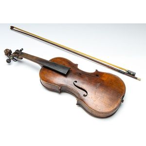 A violin in case with bow, length 60 cm and 73 cm the back…