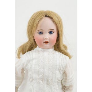 SFBJ bisque doll, blue sleeping eyes, pierced ears, light brown…