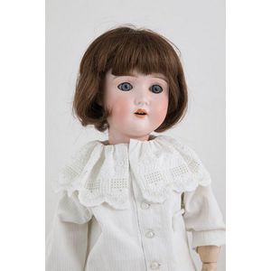 Kley & Hahn bisque doll, blue sleeping eyes, brown nylon wig on…