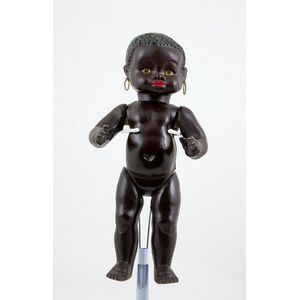All composition black character doll all painted features on…