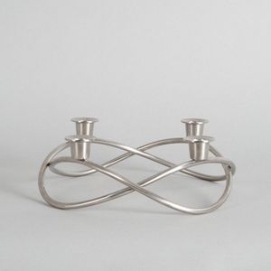 A season candle stick holder by Georg Jensen, made in Denmark.…