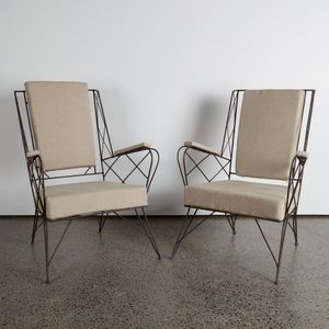A pair of wire framed French outdoor chairs, with muted cream…