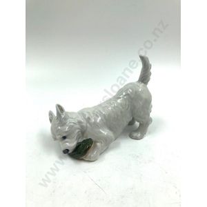 Royal Copenhagen dog with shoe figurine