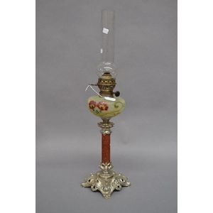 Antique French oil lamp with rouge marble support on an Art…