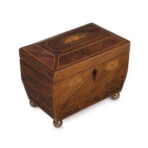 A George III Sheraton tea caddy, flame mahogany with satinwood…