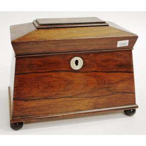 Victorian rosewood tea caddy sarcophagus shaped, on ebonised…