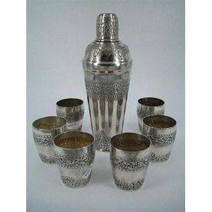 An Asian silver cocktail set comprising shaker and six cups;…