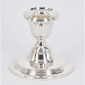 A sterling silver candlestick, circular base, Henry Matthews,…
