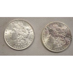Two nUNC 1890s American silver one dollar coins comprising of…