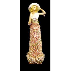 Vintage ceramic half doll with beaded robe on wood stand,…