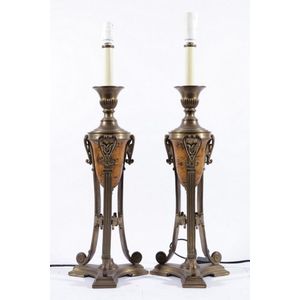 Bronze pair of converted candlesticks, decorated with lyre…