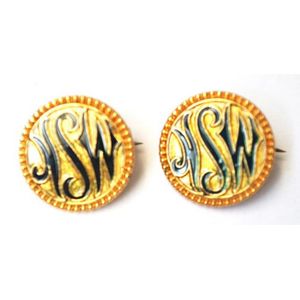 Pair early NSW enamel lapel badges marked for Amor, Sydney.